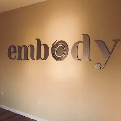 Interior dimensional letters for Embody brand wall