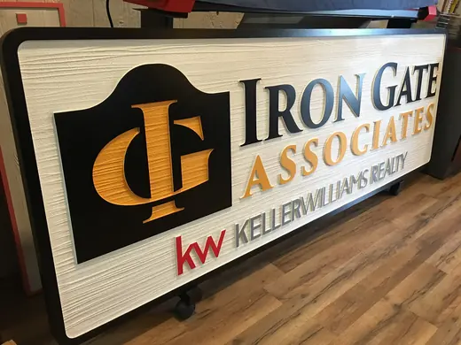 Iron Gate Associates black and gold dimensional office sign