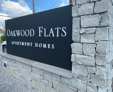 Oakwood Flats apartment monument sign face
