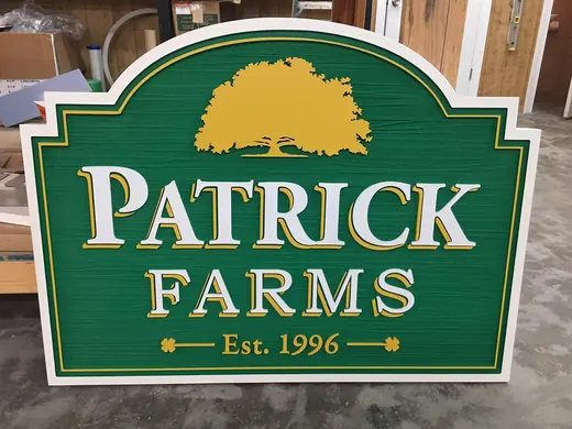 Patrick Farms green and gold community entrance sign