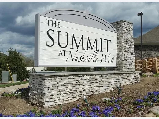 The Summit at Nashville West monument sign installed on a stacked stone base
