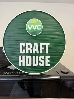 VVC Craft House round directional sign
